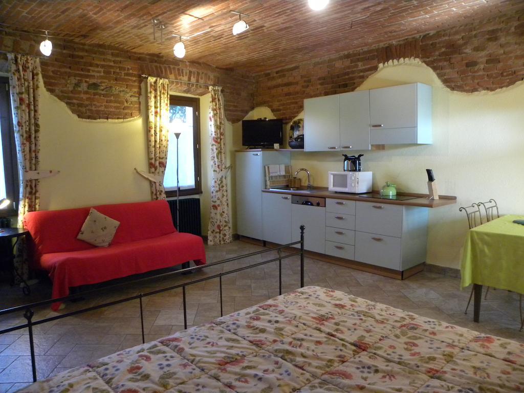 Agriturismo Fano'S Farm Suno 部屋 写真